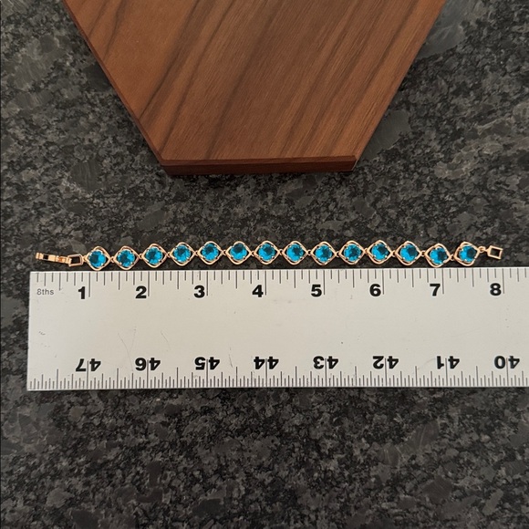 PRETTY BIRD JEWELRY 18K ROSE GOLD PLATED BRACELET WITH TURQUOISE BLUE STONES - Picture 6 of 6